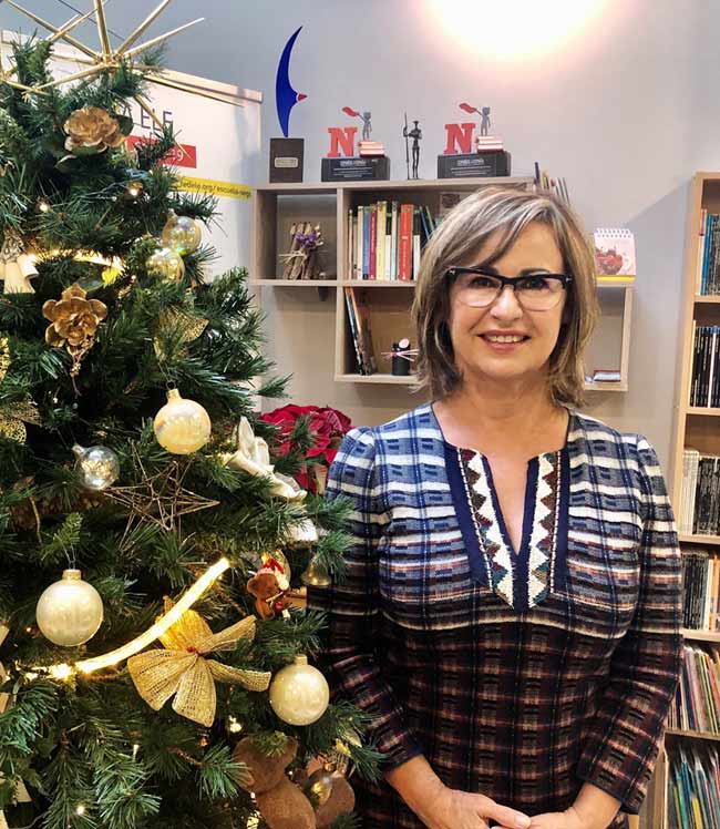 TLCdénia School of Spanish director the director next to the Christmas tree