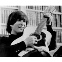 John Lennon a suonare la chitarra