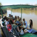 chool group in a boat Valencia, Spain, in the Albufera