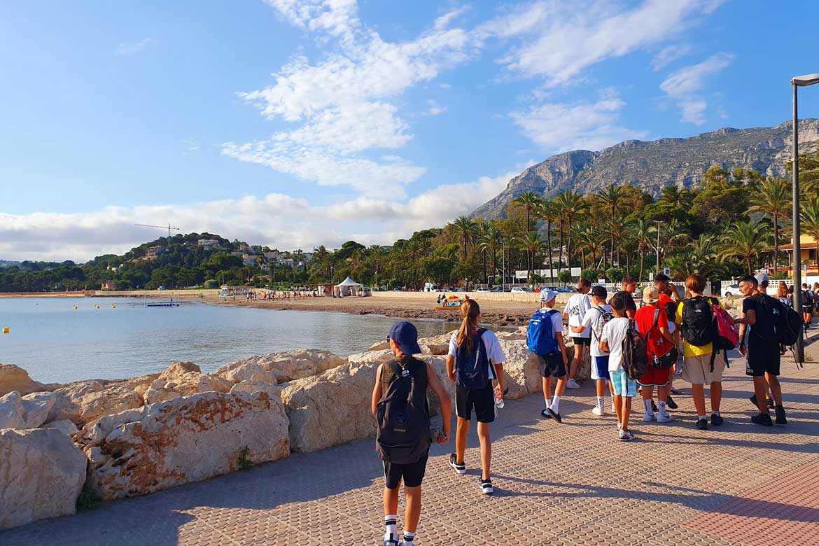 School group walking in Denia's promenade