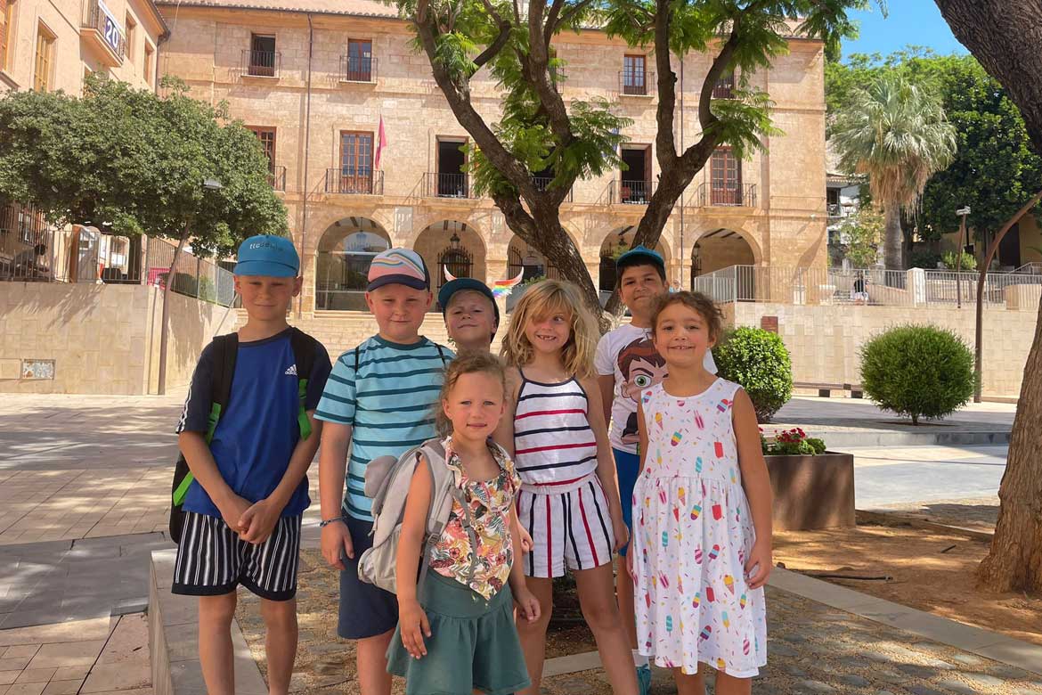 Kids in the Denia's Town Hall Square during their Spanish programme