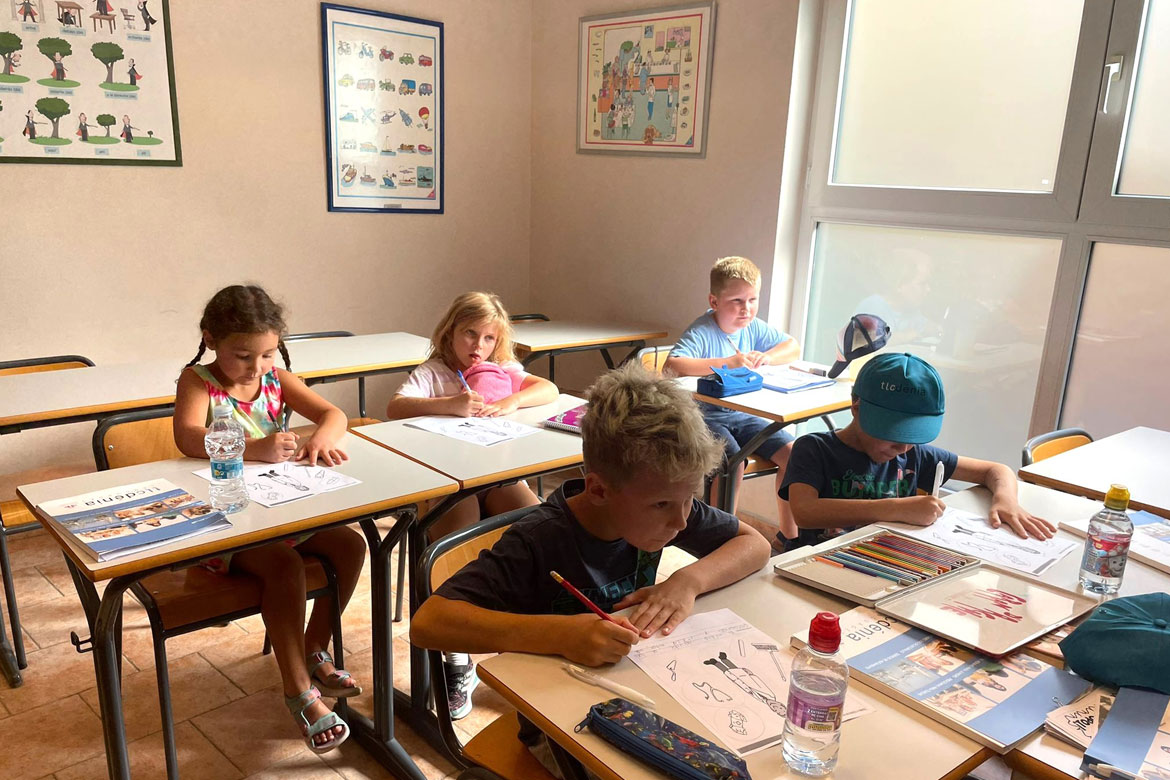 Children learning Spanish in the courses for kids in Denia, Spain