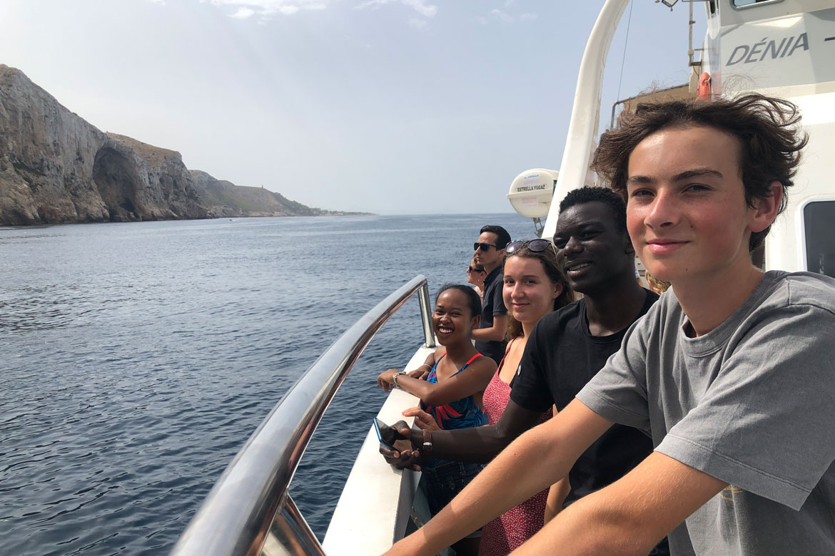 Teenagers in a boat in Denia, in Spain