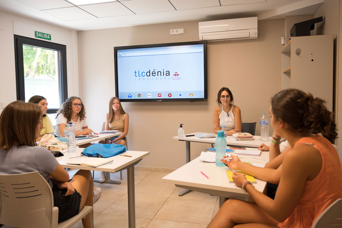 Teens and teacher in a Spanish course in Spain