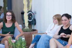Teens in TLCdénis school rooftop having a Spanish conversation lesson